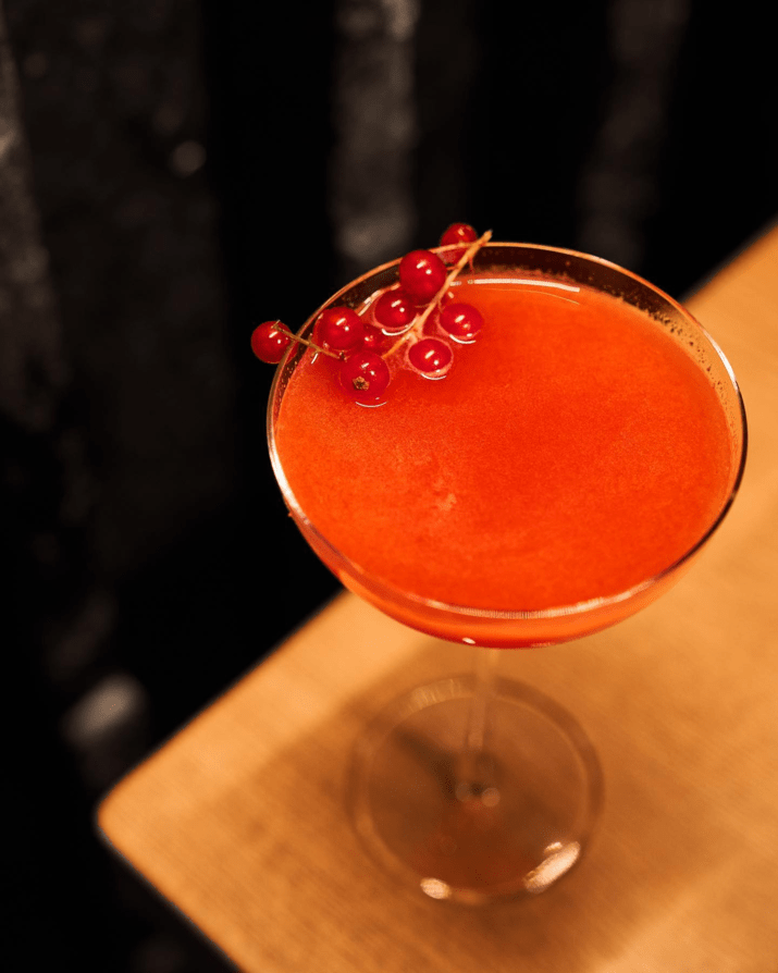 red cocktail photo by meis agency